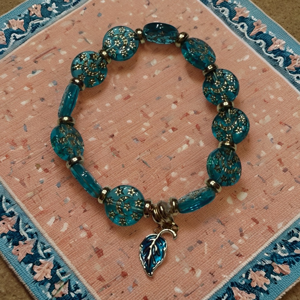 Hand Crafted Teal Acrylic Bead Bracelet with Gold Accents and Leaf Charm - Picture 5 of 5